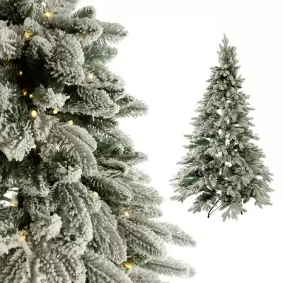 Ель искусственная в снегу с лампочками