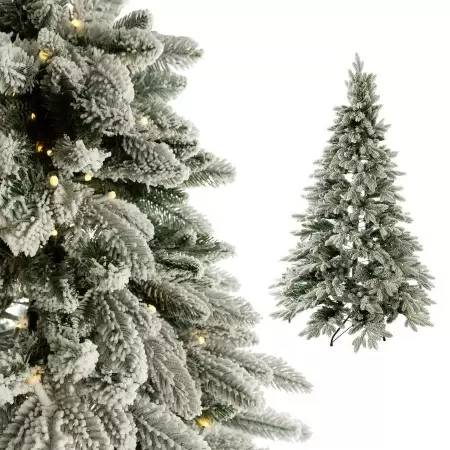 Ель искусственная в снегу с лампочками